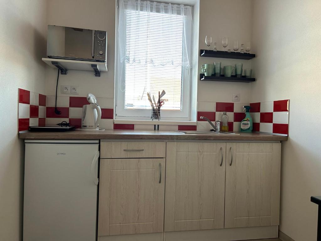 Kuchyň nebo kuchyňský kout v ubytování Apartmány Levandule