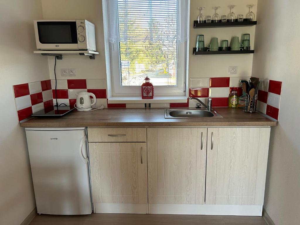 Kuchyň nebo kuchyňský kout v ubytování Apartmány Levandule