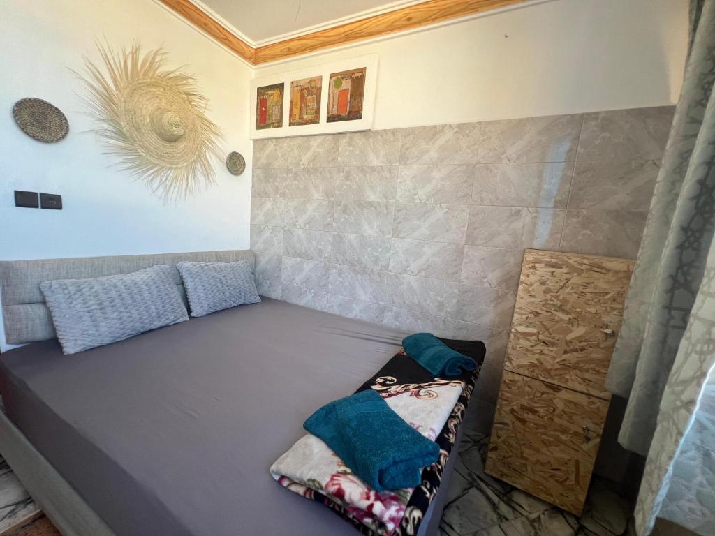 Postel nebo postele na pokoji v ubytování Sweet Surf Hostel
