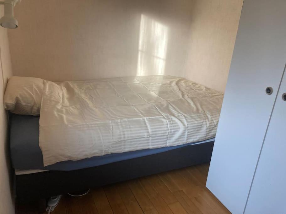 Postel nebo postele na pokoji v ubytování Le lit de la Semois