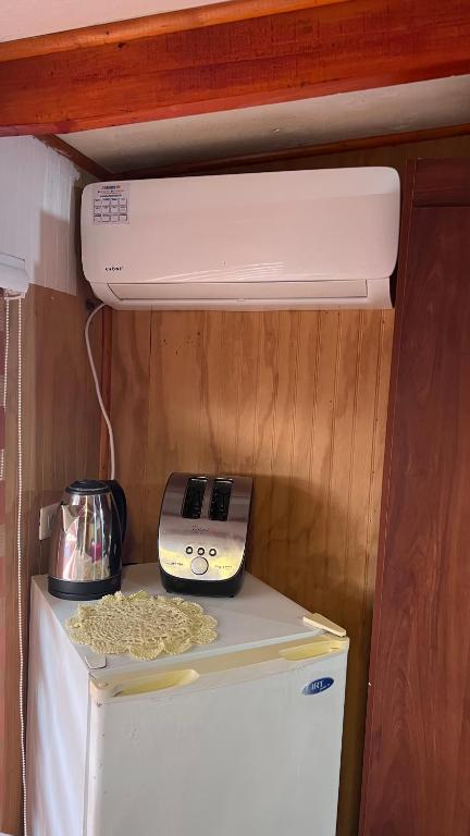 Kuchyň nebo kuchyňský kout v ubytování Small Apartment