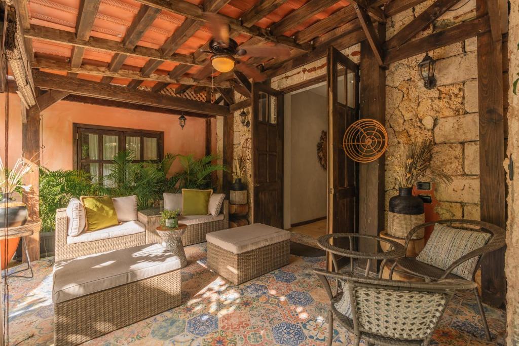 Posezení v ubytování Hotel Casa Don Luis Cap Cana by Faranda Boutique