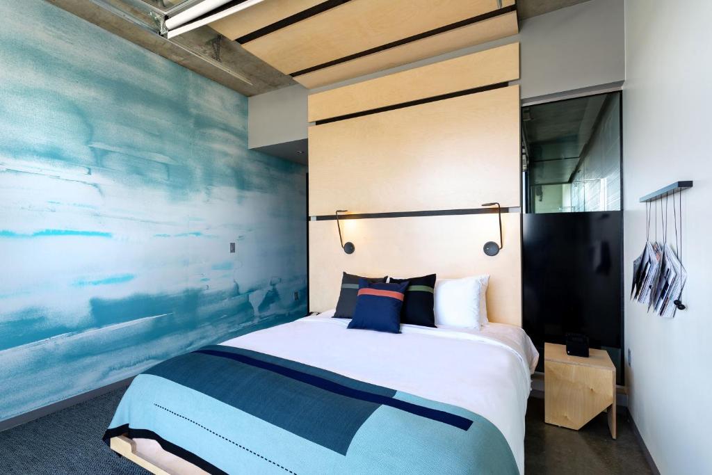 Letto o letti in una camera di The Source Hotel