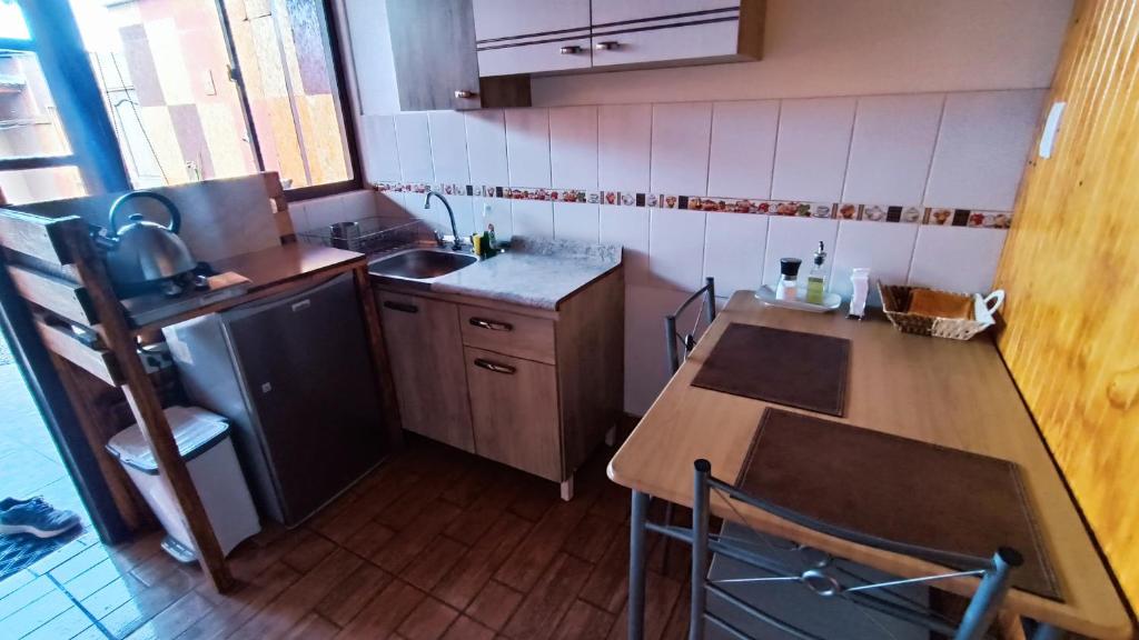 Kuchyň nebo kuchyňský kout v ubytování Hostal Yurak