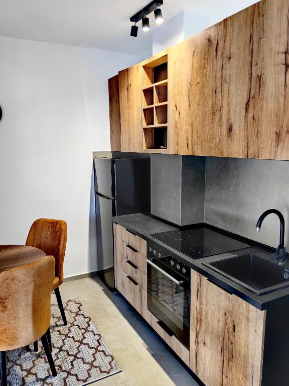 Kuchyň nebo kuchyňský kout v ubytování Vila Rosa, apartman 2