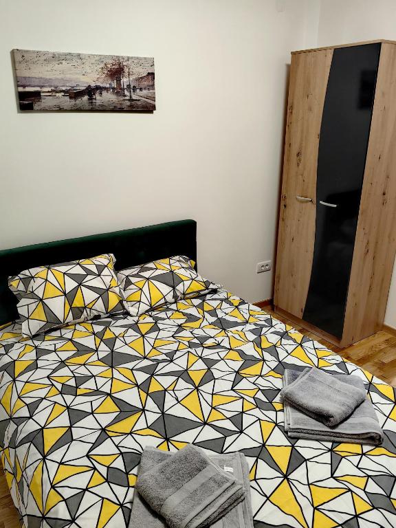 Postel nebo postele na pokoji v ubytování Vila Rosa, apartman 3