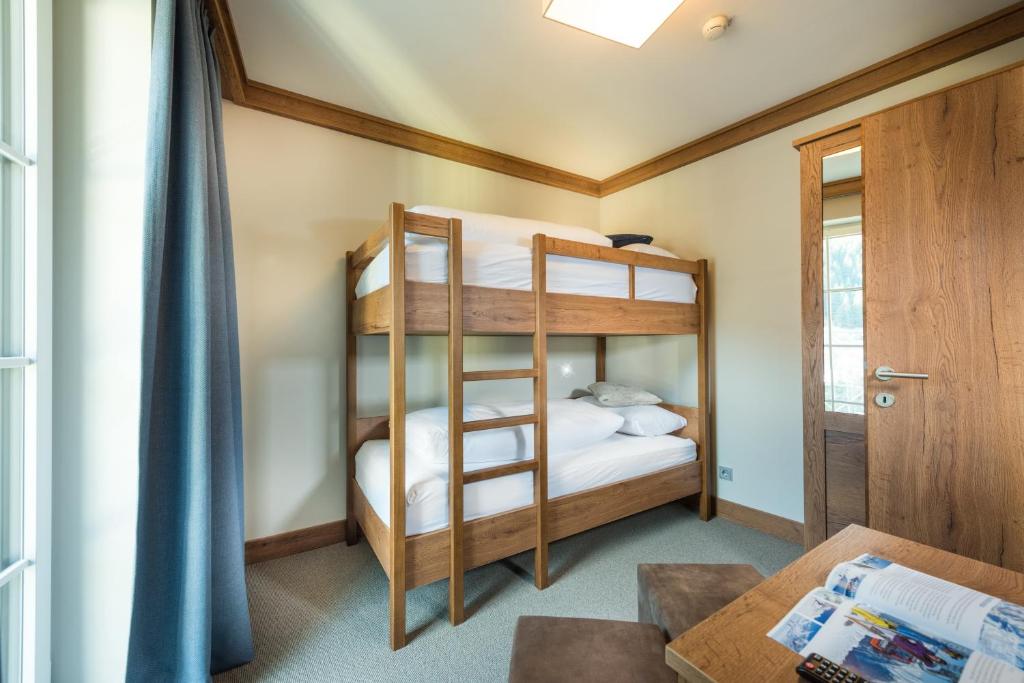 Posteľ alebo postele v izbe v ubytovaní Hotel Eden Rock
