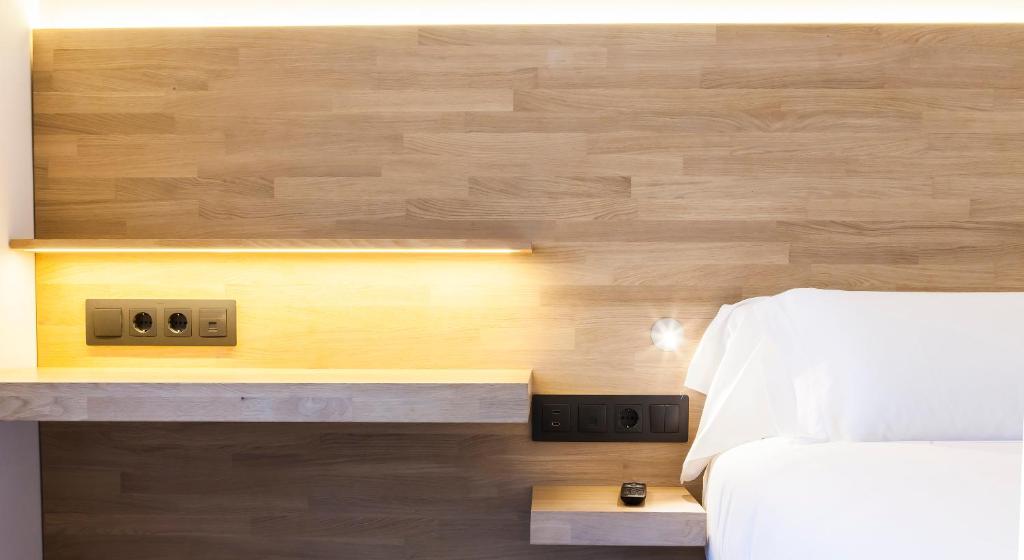 Cama o camas de una habitación en Hotel A Pamplona