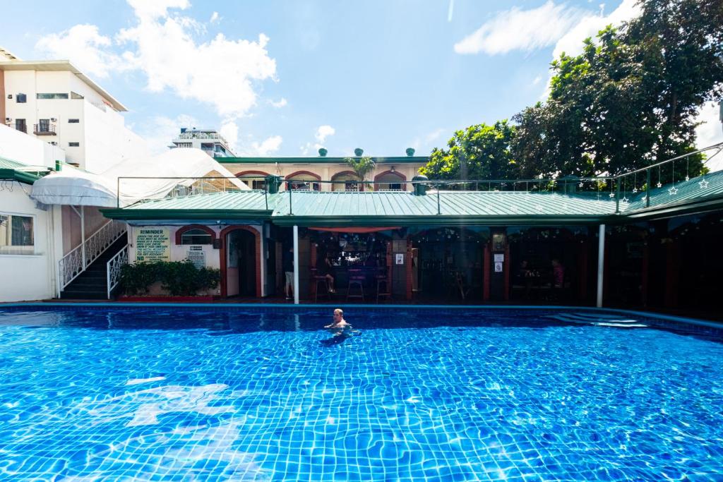 Bazén v ubytování Orchid Inn nebo v jeho okolí