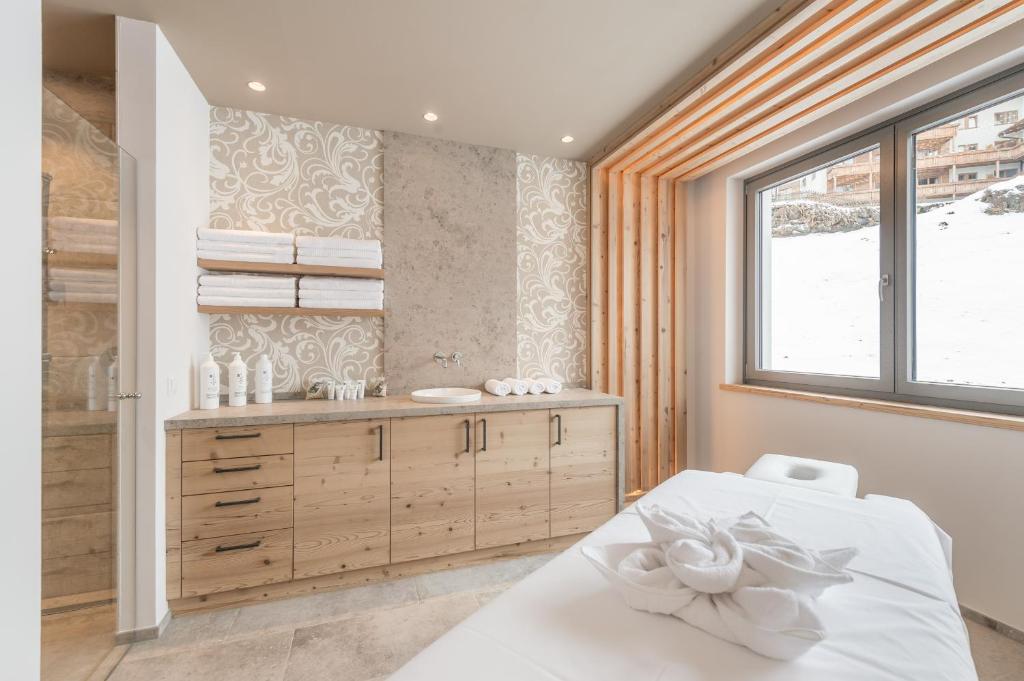 Кровать или кровати в номере Hotel Gurglhof Superior