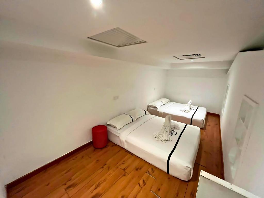 Postel nebo postele na pokoji v ubytování Smile Hotel Shah Alam ICity