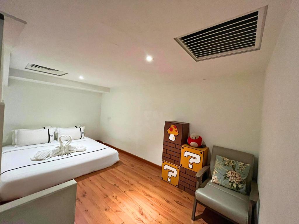 Postel nebo postele na pokoji v ubytování Smile Hotel Shah Alam ICity
