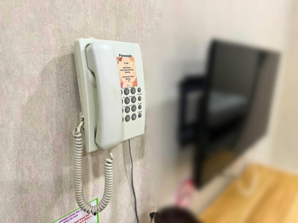 TV a/nebo společenská místnost v ubytování Smile Hotel Shah Alam ICity