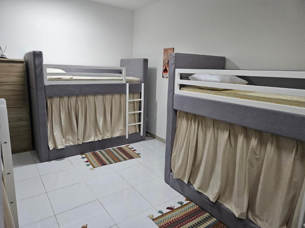 Postel nebo postele na pokoji v ubytování Legacy Hostel