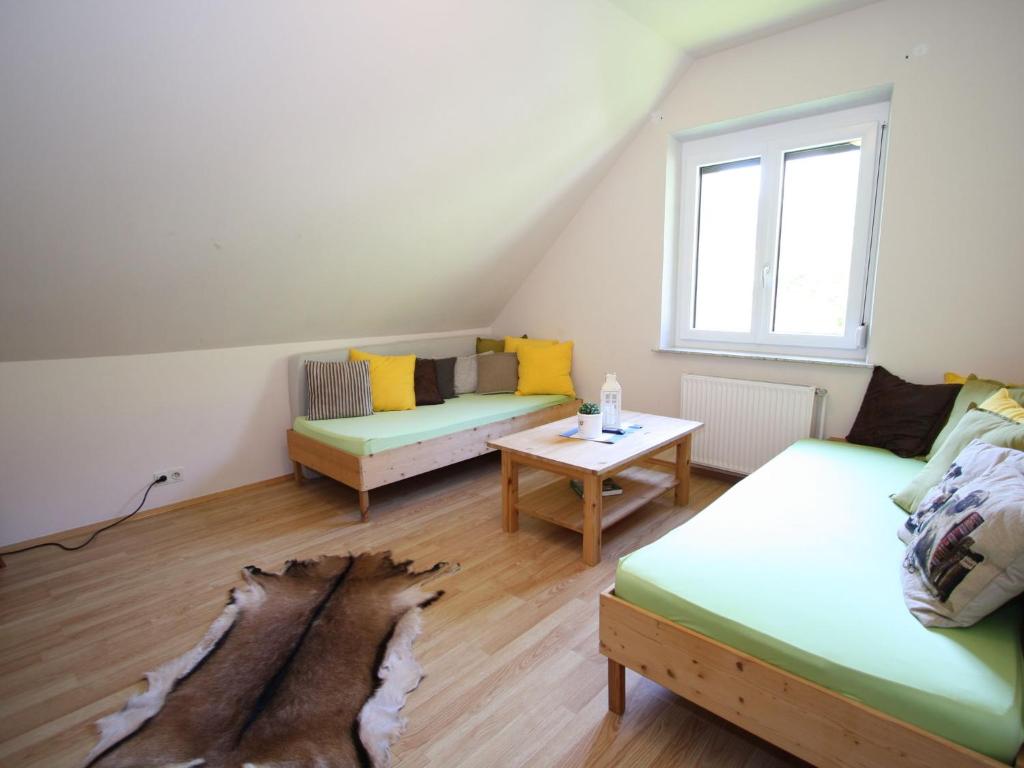 Ein Sitzbereich in der Unterkunft Apartment Stallbauer 1