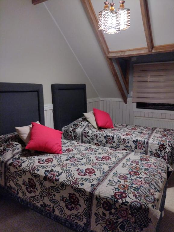Postel nebo postele na pokoji v ubytování Tribal house