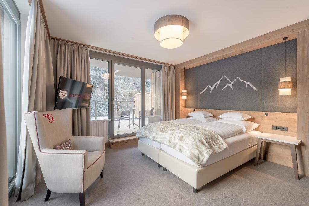 Кровать или кровати в номере Hotel Gurglhof Superior