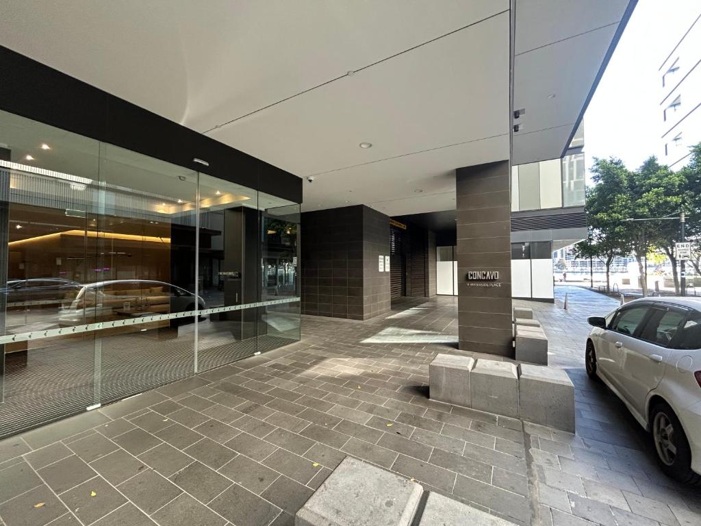 a car parked in front of a building at Immaculate 1br Apt In Docklands Pool Free Parking in Melbourne