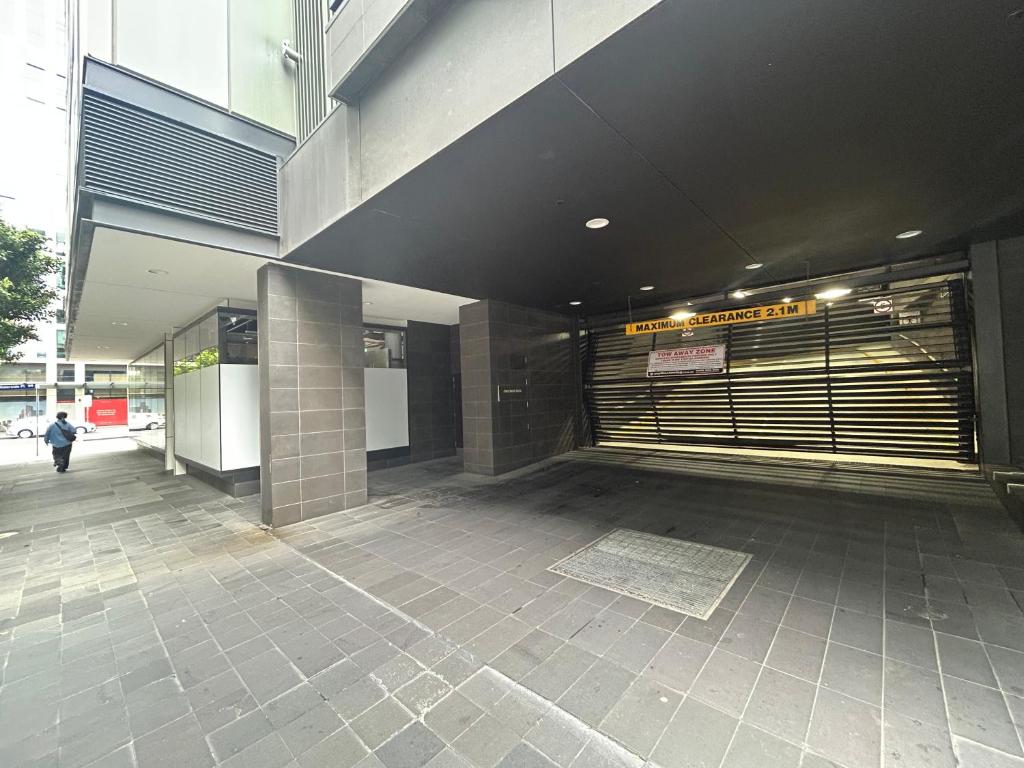 a building with a large door on the side of it at Immaculate 1br Apt In Docklands Pool Free Parking in Melbourne