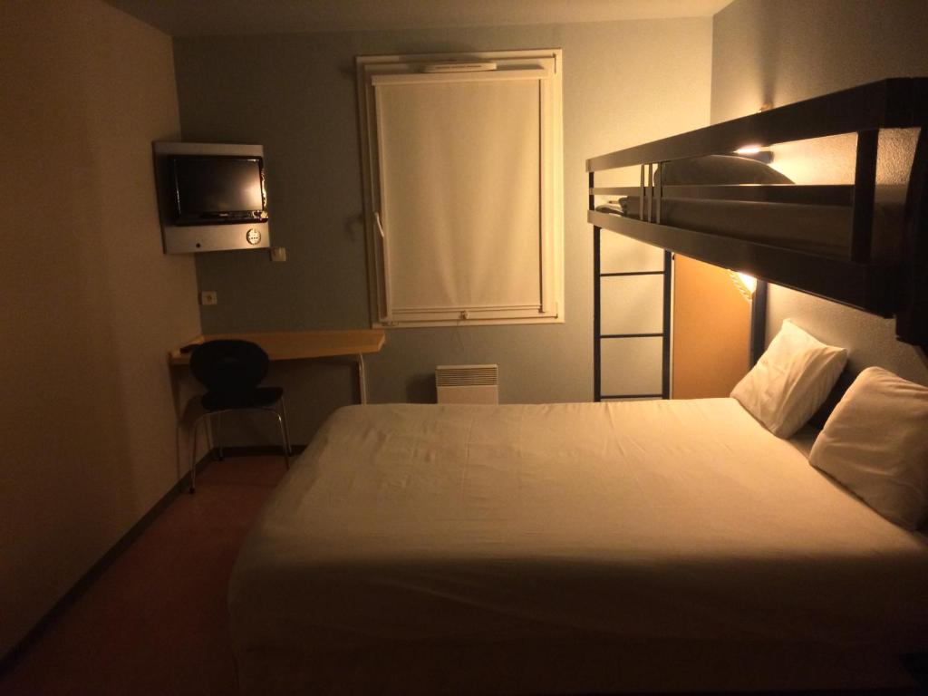 Postel nebo postele na pokoji v ubytování ibis budget Bar le Duc