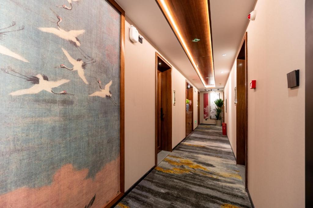Fotografie z fotogalerie ubytování Fuxue QiuGuo Hotel Beijing Nanluoguxiang Siheyuan Branch v Pekingu