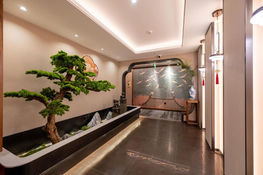 Fotografie z fotogalerie ubytování Fuxue QiuGuo Hotel Beijing Nanluoguxiang Siheyuan Branch v Pekingu