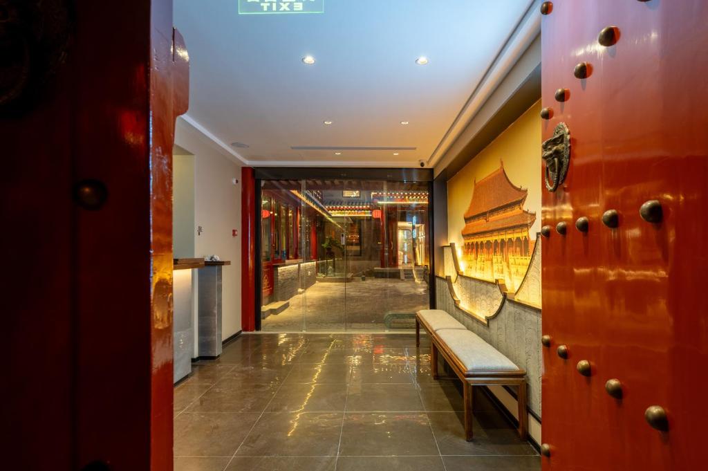 Fotografie z fotogalerie ubytování Fuxue QiuGuo Hotel Beijing Nanluoguxiang Siheyuan Branch v Pekingu
