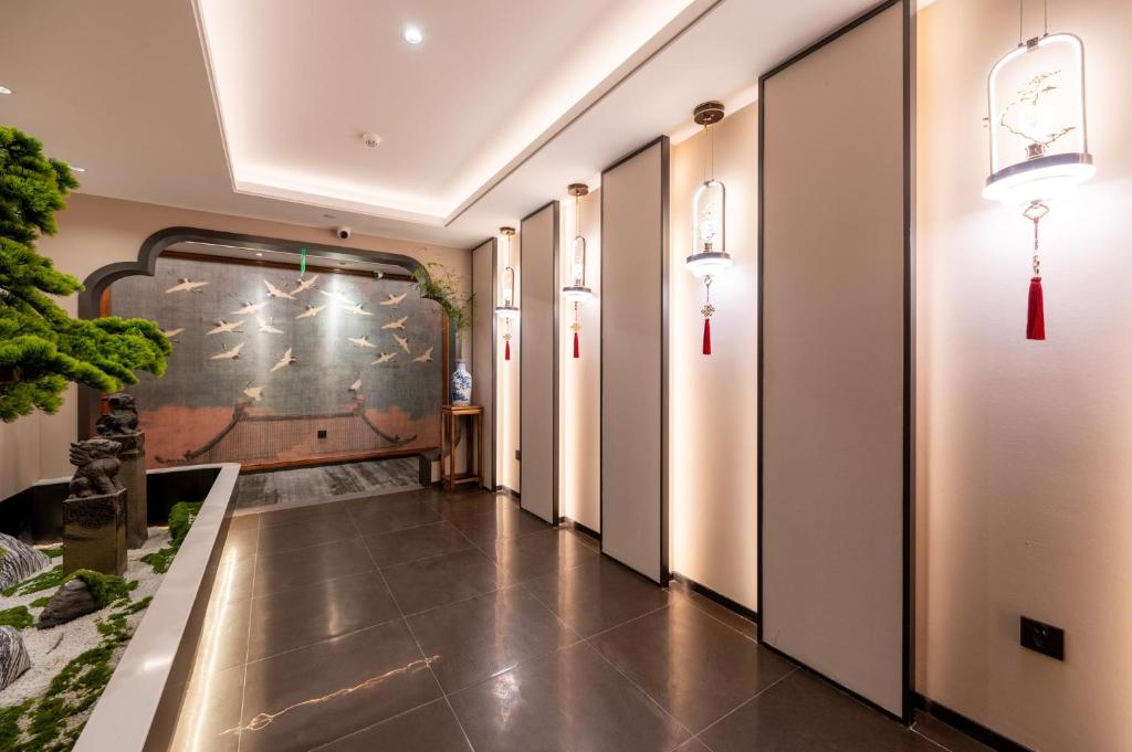 Fotografie z fotogalerie ubytování Fuxue QiuGuo Hotel Beijing Nanluoguxiang Siheyuan Branch v Pekingu