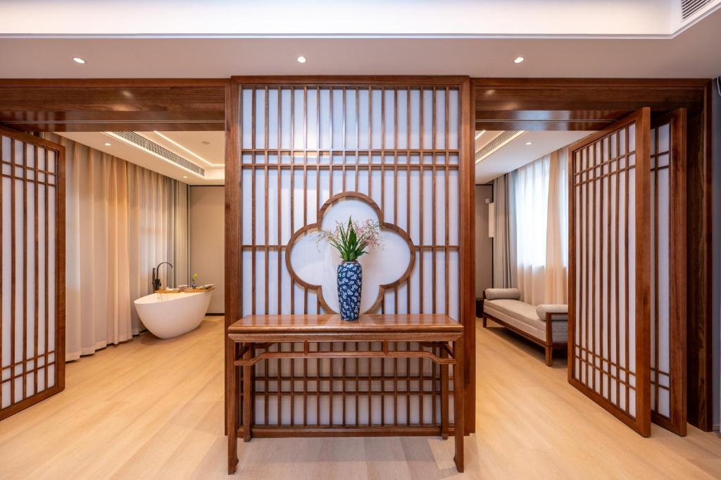 Posezení v ubytování Fuxue QiuGuo Hotel Beijing Nanluoguxiang Siheyuan Branch