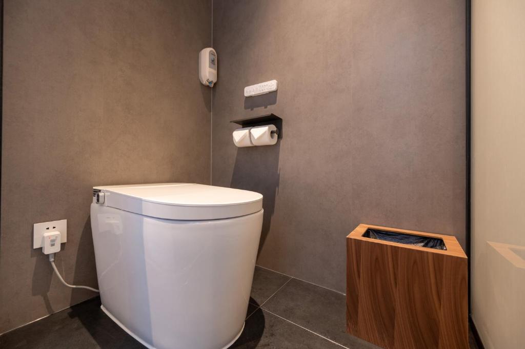Fotografie z fotogalerie ubytování Fuxue QiuGuo Hotel Beijing Nanluoguxiang Siheyuan Branch v Pekingu