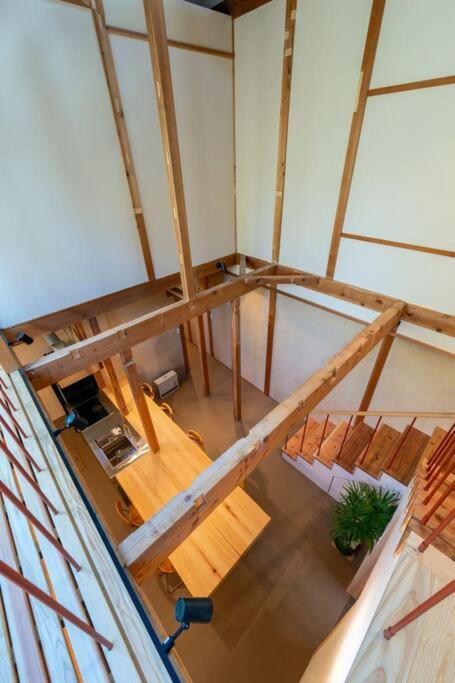 Postel nebo postele na pokoji v ubytování 飛騨高山一の雫