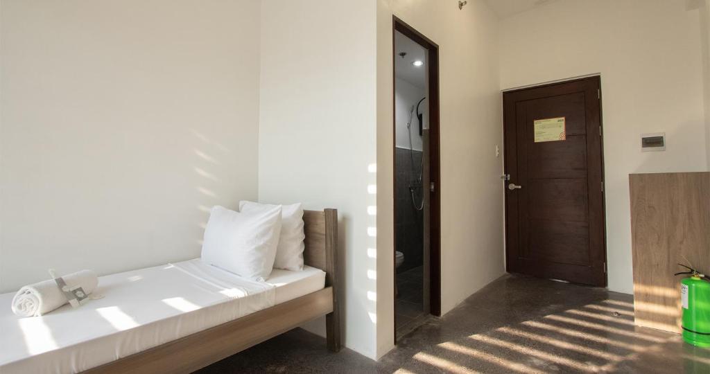 Postel nebo postele na pokoji v ubytování The Pad CoLiving