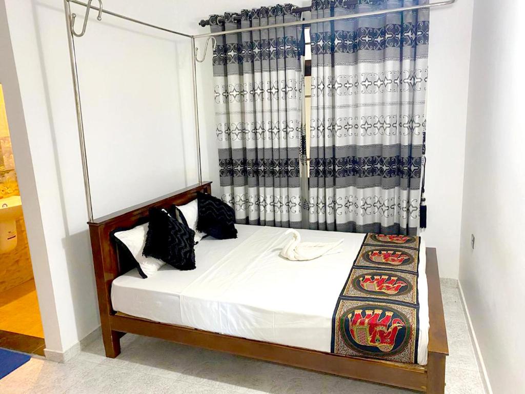 Postel nebo postele na pokoji v ubytování Haritha Resort Yala