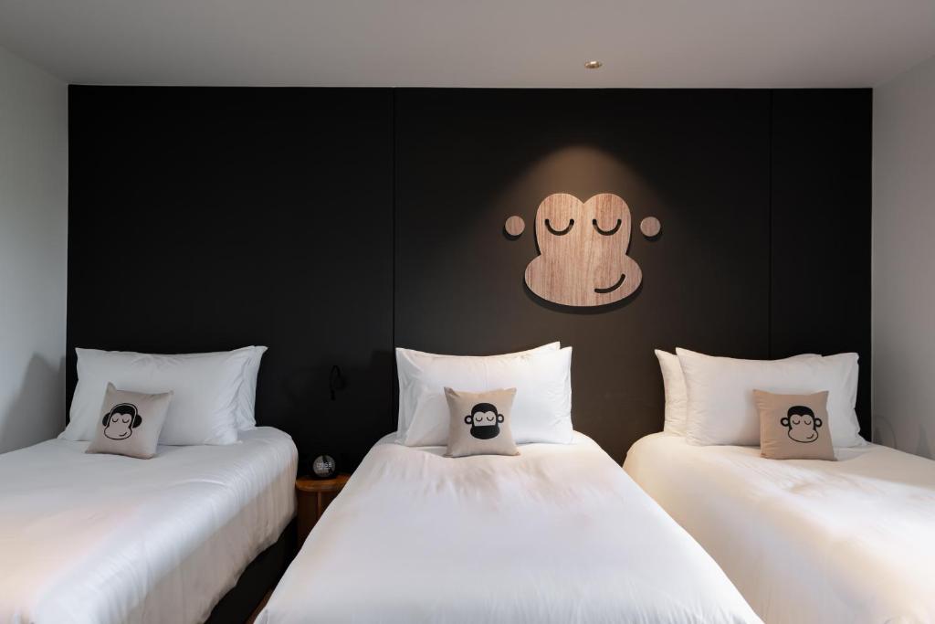 Postel nebo postele na pokoji v ubytování Blu Monkey Hub and Hotel Laguna, Bangtao Phuket