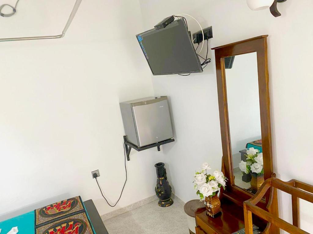 TV a/nebo společenská místnost v ubytování Haritha Resort Yala