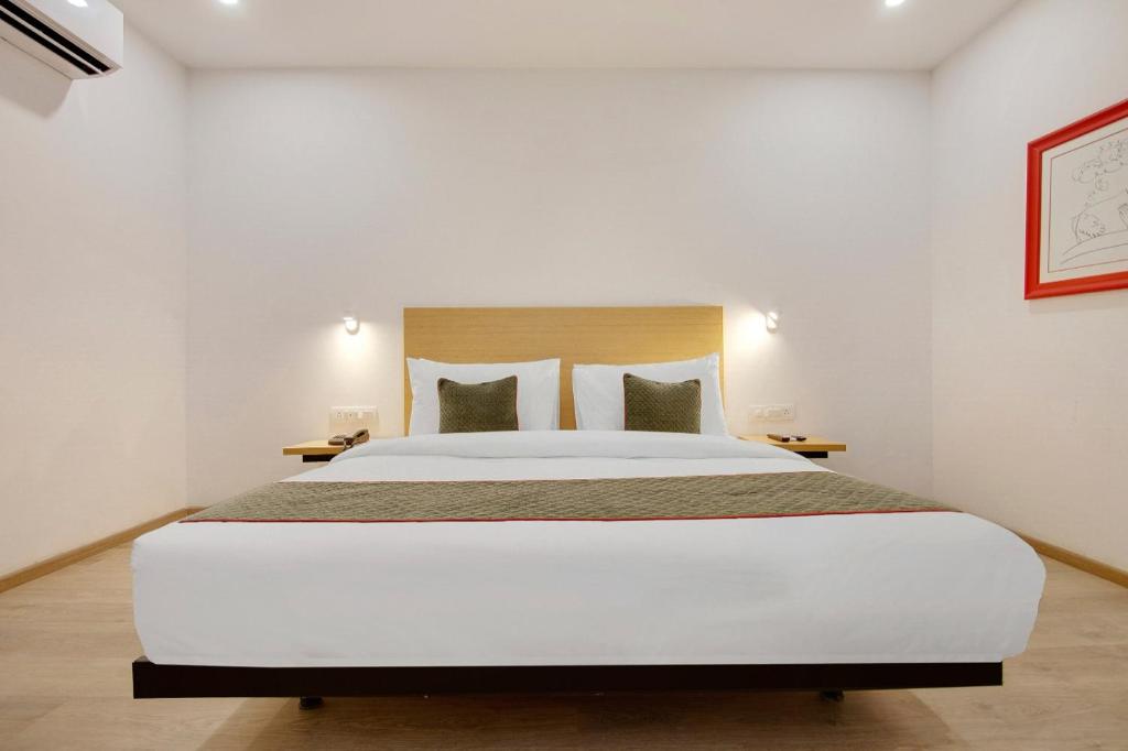 Postel nebo postele na pokoji v ubytování Hotel New City Lite