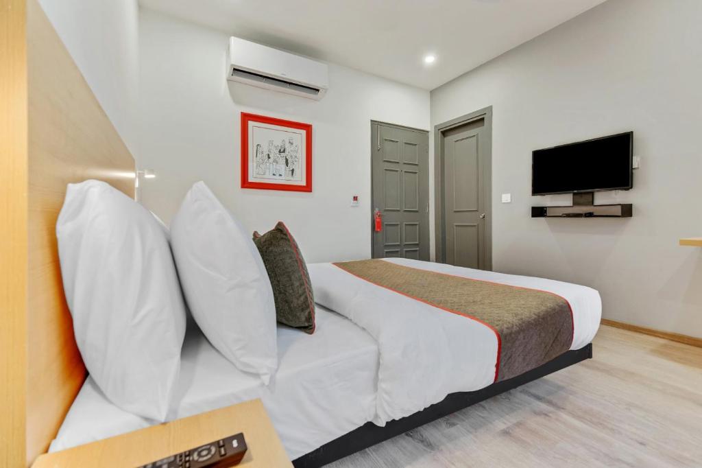 TV a/nebo společenská místnost v ubytování Hotel New City Lite