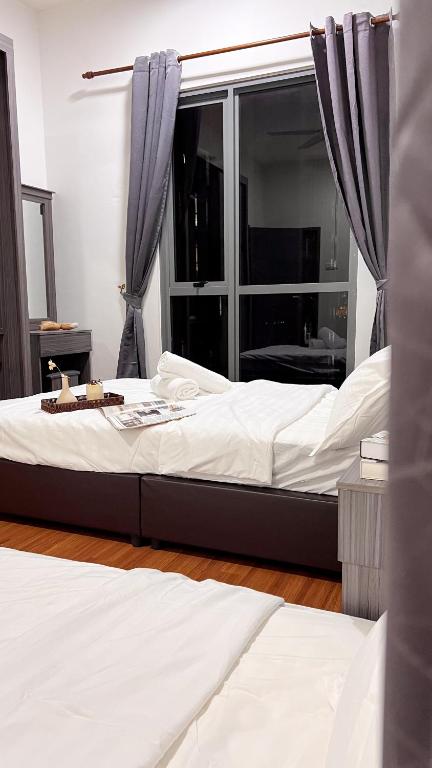 Postel nebo postele na pokoji v ubytování Da Men Subang Jaya USJ by Iconique