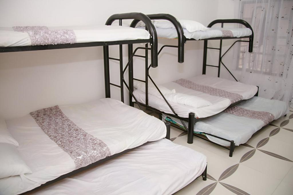 Postel nebo postele na pokoji v ubytování Condominio Tolima