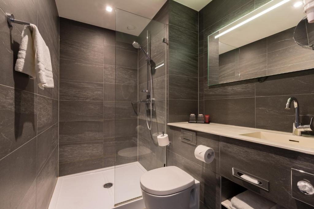 Koupelna v ubytování Leonardo Hotel Groningen