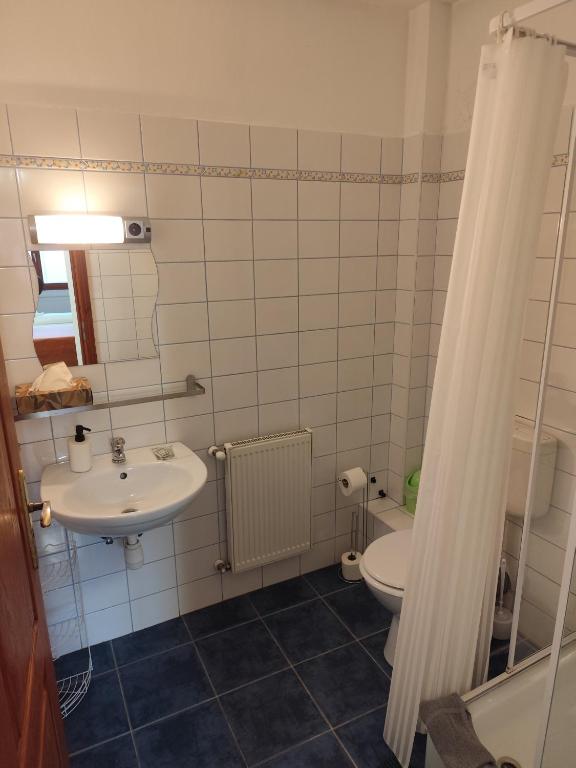 Koupelna v ubytování Szent Kristóf Apartmanhotel