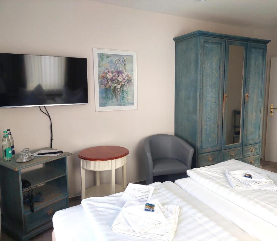 Postel nebo postele na pokoji v ubytování Hotel Villa Weststrand