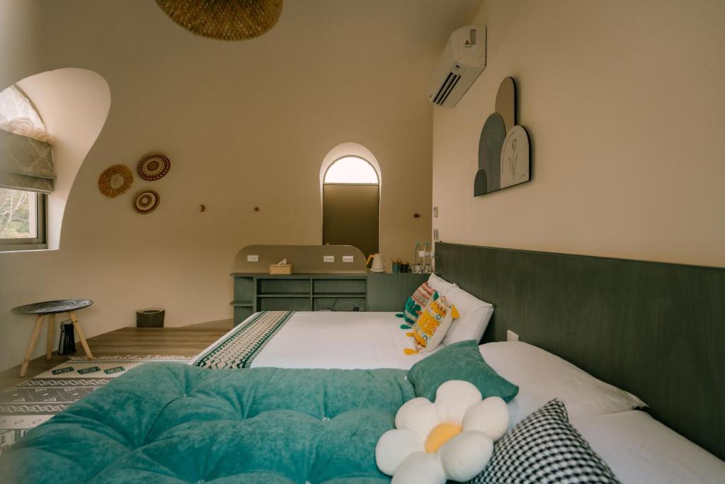 Postel nebo postele na pokoji v ubytování BohoLand
