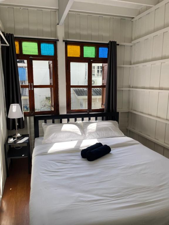Postel nebo postele na pokoji v ubytování Green Cabin Hostel