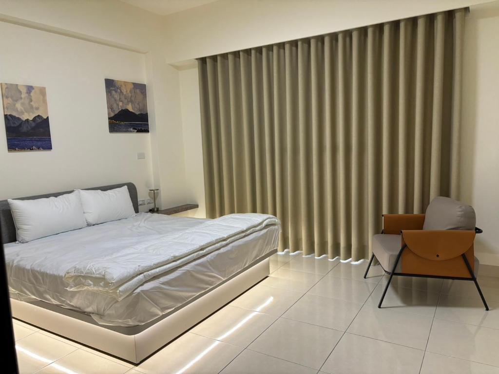 Katil atau katil-katil dalam bilik di Okura Hotel