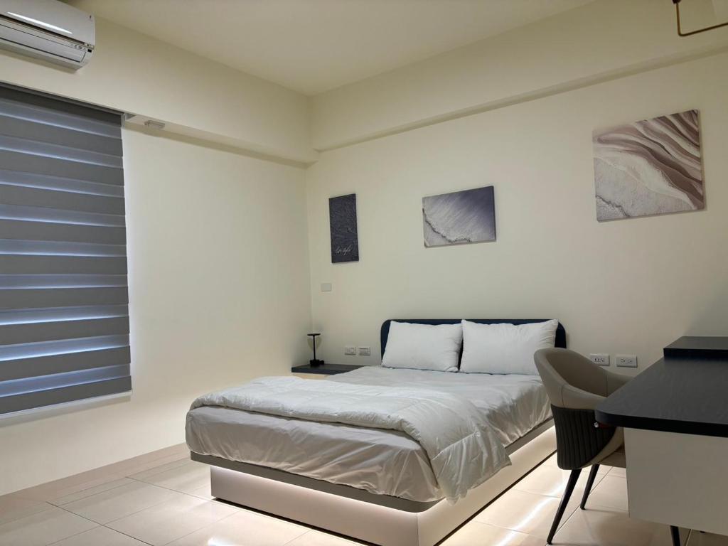 Katil atau katil-katil dalam bilik di Okura Hotel