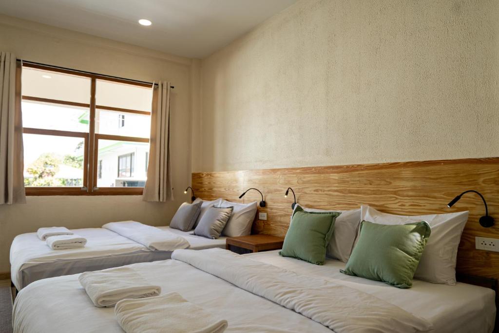 Yimwhan House 03, Chao Phrom Market Pier客房内的一张或多张床位