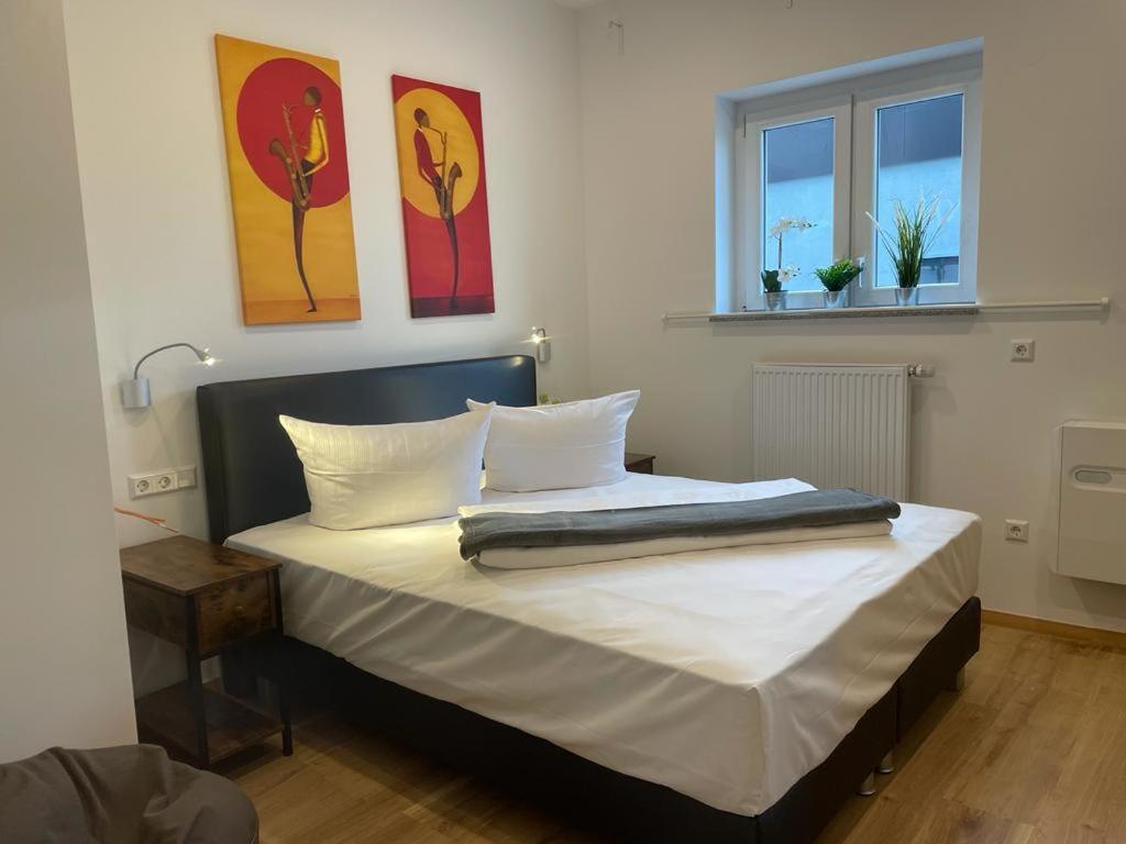 Postel nebo postele na pokoji v ubytování Hotel Rosenhof GmbH