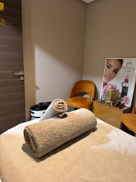 Postel nebo postele na pokoji v ubytování Swiss Continental Hôtel