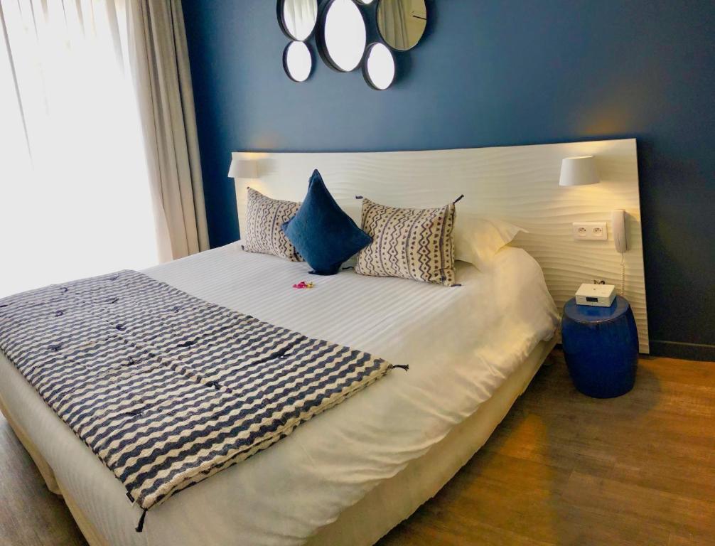 Кровать или кровати в номере Boutique Hotel & Spa la Villa Cap Ferrat
